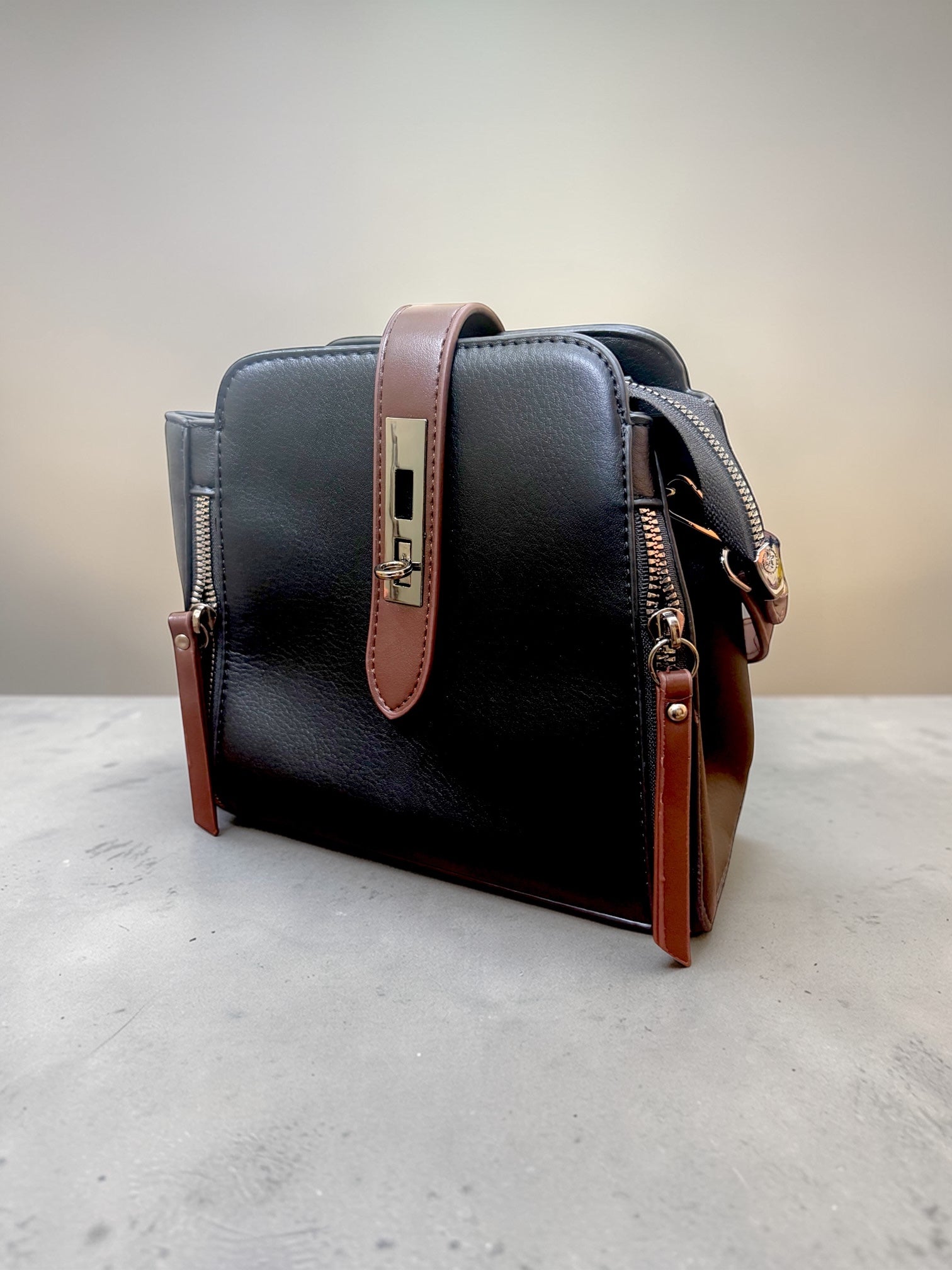 Elegant Black & Brown Women’s Sling Bag with Multi-Zip Compartments